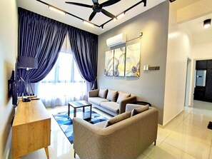 Standard Apartment | Living area | 24-inch Smart TV with digital channels - The Horizon Ipoh Emerald By Grab A Stay  (Ipoh)
