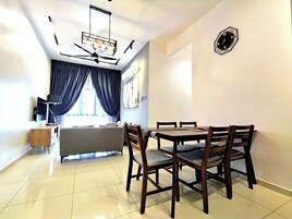 Standard Apartment | Living area | 24-inch Smart TV with digital channels
