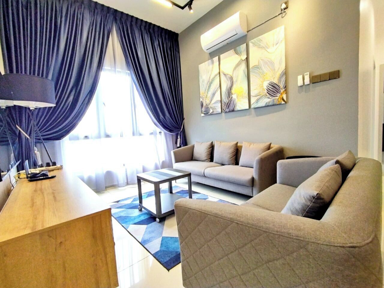 Standard Apartment | Living area | 24-inch Smart TV with digital channels