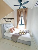 Executive Apartment | Blackout drapes, iron/ironing board, free WiFi