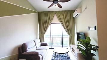 Comfort Apartment, 2 Bedrooms, Non Smoking, City View | Living area | 24-inch Smart TV with digital channels
