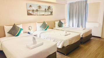 Comfort Triple Room, City View | Desk, laptop workspace, free WiFi, bed sheets