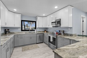 Fridge, microwave, oven, stovetop - Waterfront Paradise in St. James City – 2BR/2BA with Pool, Dock & Tiki Hut (Saint James City)