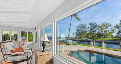 Waterfront stunner with dock, saltwater pool, custom kitchen, AC - dog-friendly