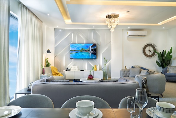 Appartement Deluxe, 2 chambres | Coin séjour | TV connectée
