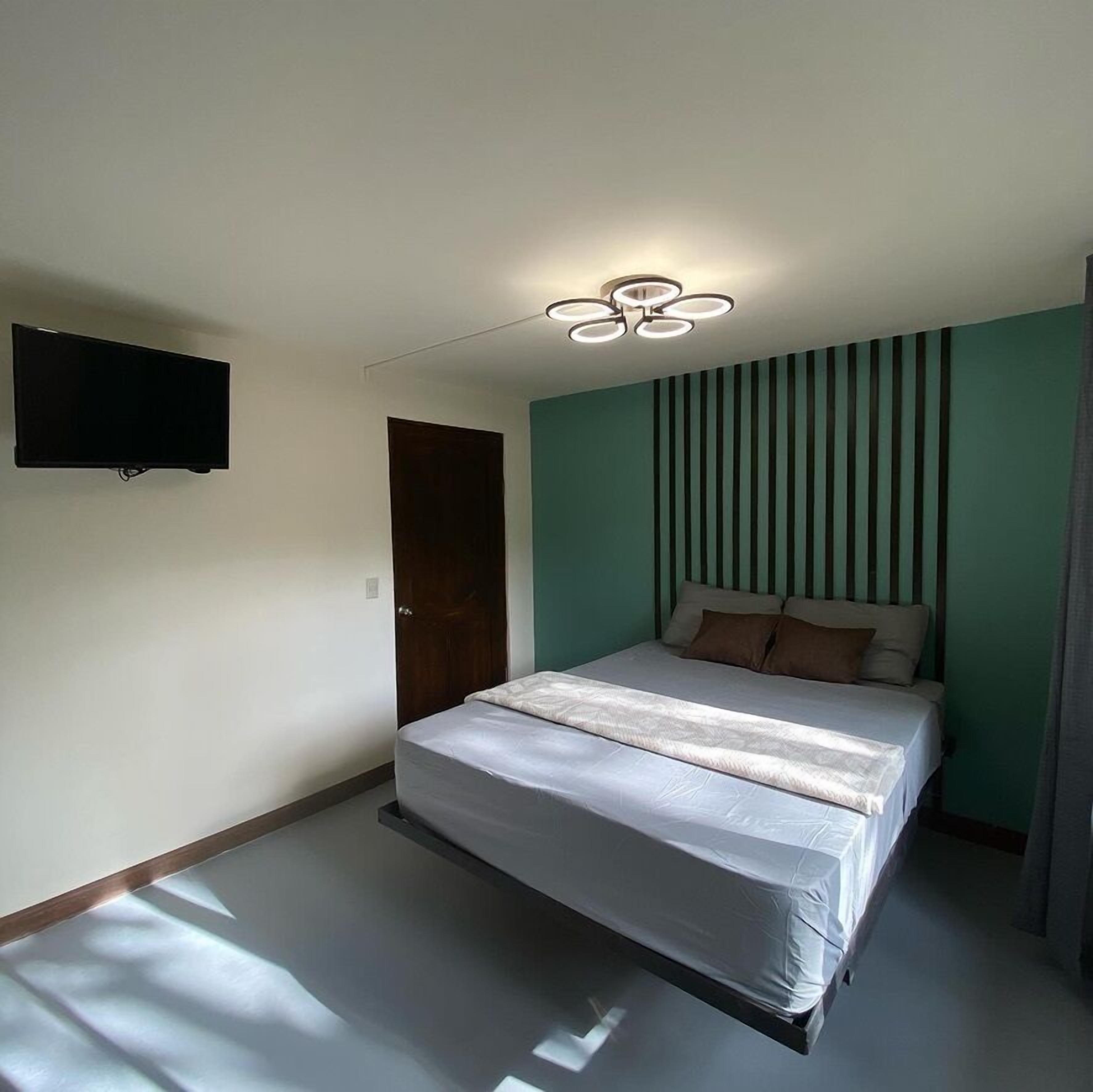 Deluxe Apartment, Pool Access, Garden View | Hypo-allergenic bedding, free WiFi