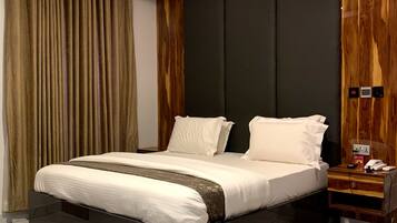 Luxury Room | Down comforters, minibar, in-room safe, blackout drapes