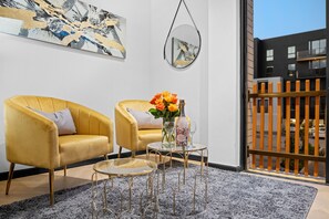 Apartment (0 Bedroom) | Living area | 42-inch LED TV with satellite channels - Nine Palms 214 (Cape Town)