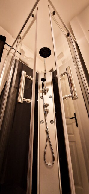 Hair dryer, towels, soap, shampoo