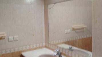 Shower, designer toiletries, bathrobes, slippers