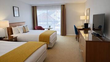 Premium Quadruple Room, 2 Double Beds | In-room safe, desk, laptop workspace, blackout drapes