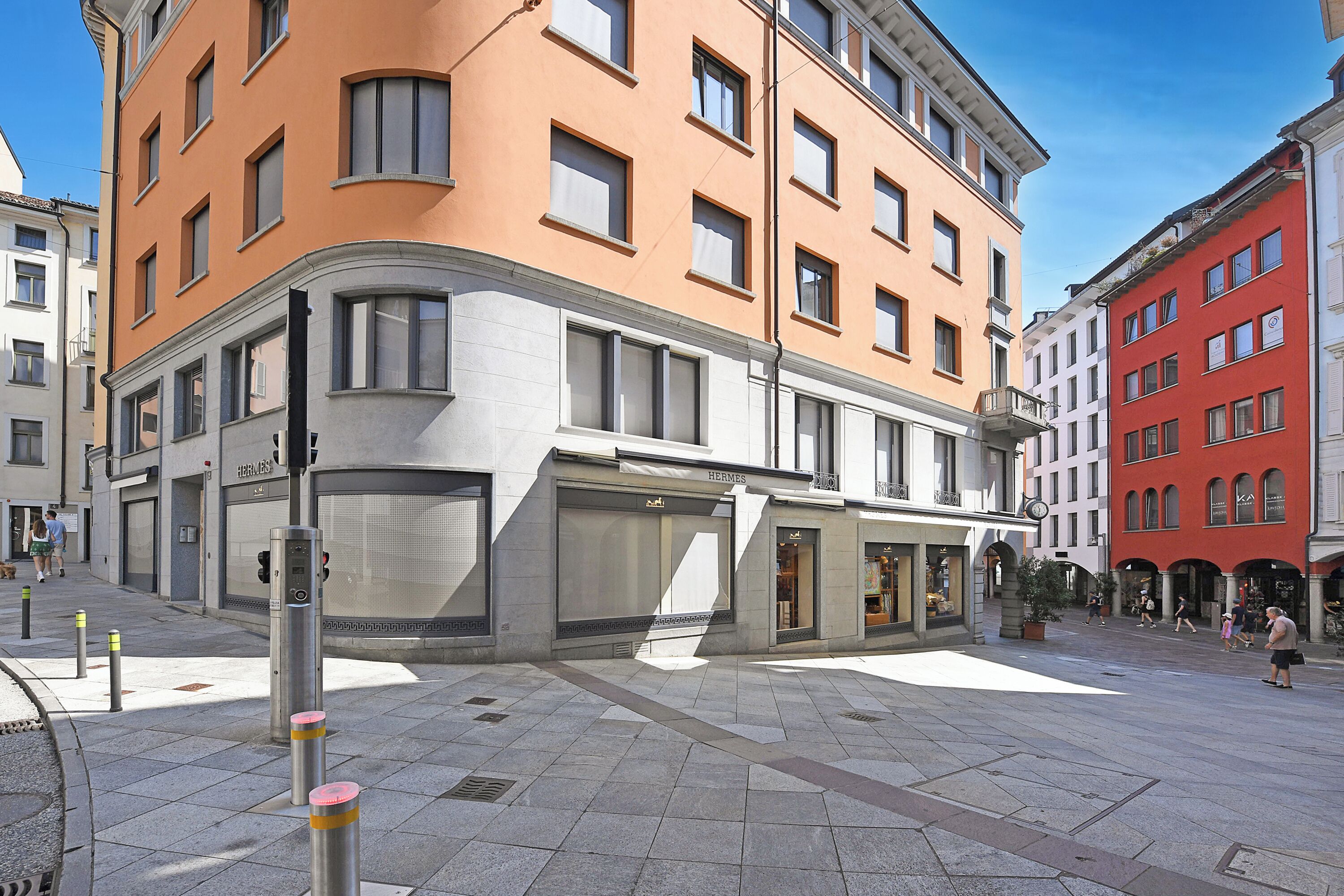 A multi-story building with a ground-level storefront and upper residential or commercial spaces.