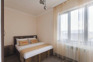 1 habitación, tabla de planchar con plancha, wifi y ropa de cama 