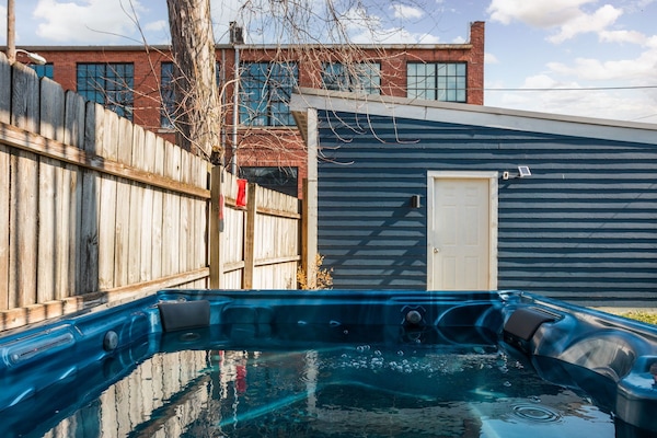 Relax and unwind in our private hot tub, perfect for soaking after a day of exploring the city. Nestled in a peaceful outdoor setting, the hot tub offers both comfort and privacy.
