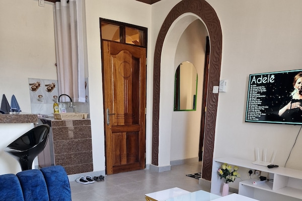 Comfort Apartment | Living area | Flat-screen TV