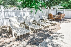 Outdoor dining - 2nd Row 5 BR Beach House with a Heated Private Pool! Costalotta (Surfside Beach)