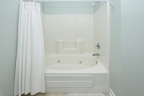 Jetted bath, soap, toilet paper