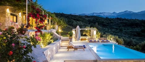 Outdoor pool, pool umbrellas, pool loungers