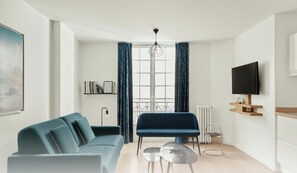 Appartement 21 | Coin séjour | TV connectée de 35 pouces avec chaînes numériques