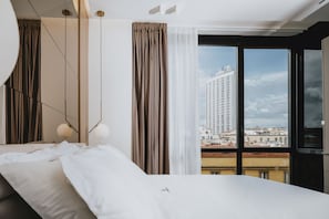 Superior kamer | Donzen dekbedden, pillowtop-bedden, een minibar, een kluis op de kamer