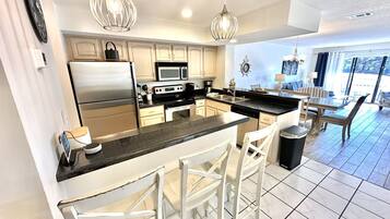 Coffee/tea maker, fridge, microwave, oven