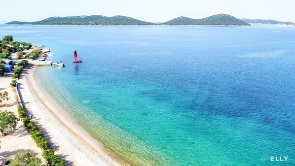 Enjoy stunning views of the beach and sea from your hotel room.