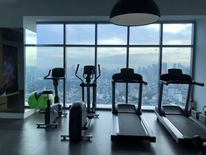 Work out with a city view at this gym, featuring treadmills, ellipticals, and a stationary bike.