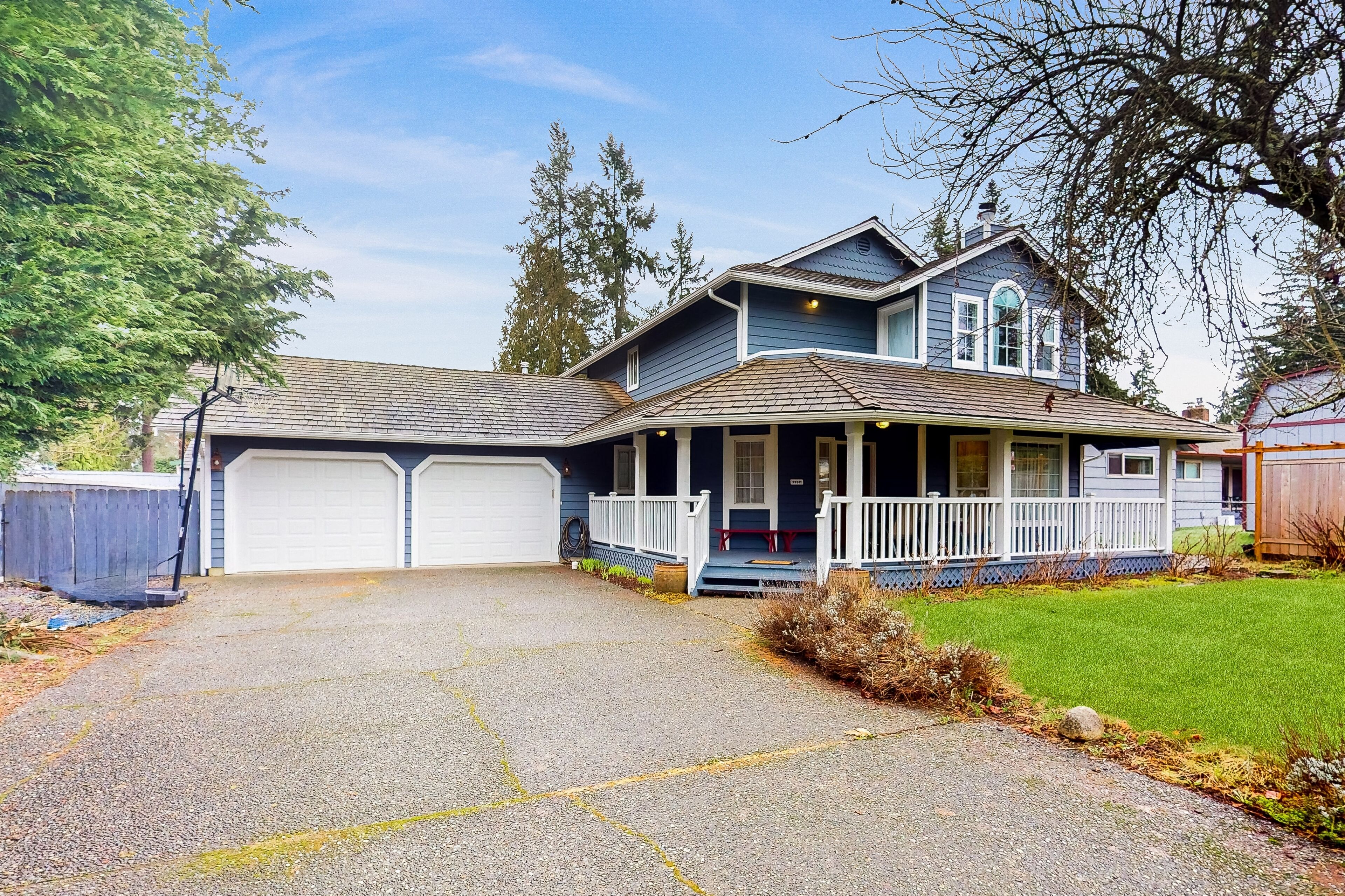 Perfectly located & renovated home with enclosed yard, firepit, W/D, & fireplace