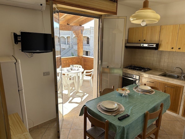 Apartment | Living area | 32-inch flat-screen TV with digital channels