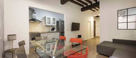 Comfort Apartment, 2 Bedrooms | Living area | 40-inch flat-screen TV with digital channels