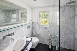 Shower, hair dryer, towels, soap