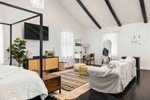 1 bedroom, desk, iron/ironing board, travel crib