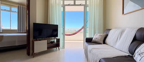 Apartment | Living area | 43-inch Smart TV with satellite channels