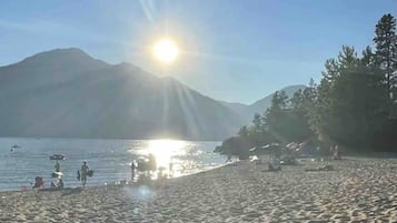 On the beach, sun loungers, beach towels