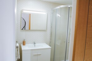 Hair dryer, towels, soap, shampoo