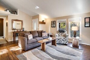 TV, fireplace - Riverfront Retreat with Deck, Fire Pit & Views (Franklin)