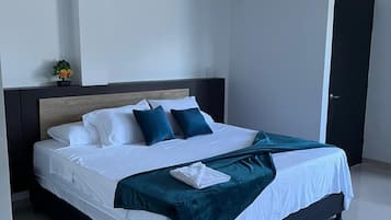 Deluxe Room, Beach View | Individually decorated, individually furnished, desk, free WiFi