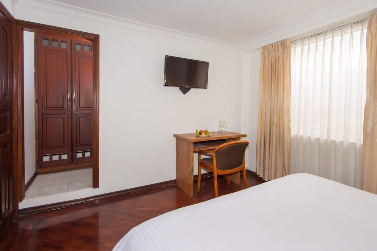 Premium bedding, desk, free WiFi, bed sheets