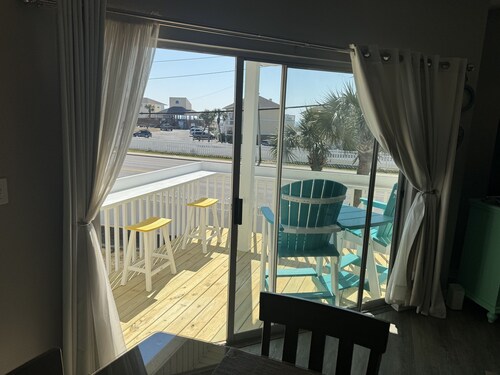 Coastal Charm, pet friendly, private beach, free beach chairs service. 