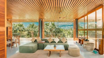 Casa Royal, vista a la playa | Área de sala de estar