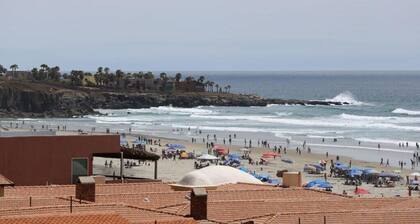 Private beach apartment with balcony and direct access to sandy beach!