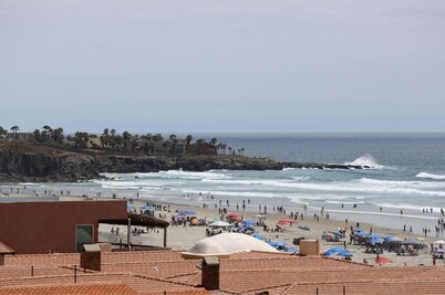 Private beach apartment with balcony and direct access to sandy beach!