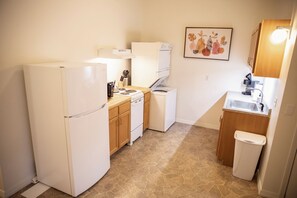 Fridge, microwave, oven, stovetop - Condo 302 is a spacious two-bedroom/two-bathroom unit at Cooper's Pointe (Cherokee Village)