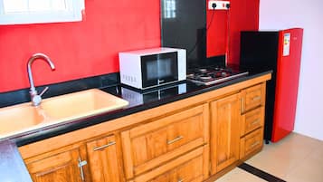 Familienapartment, 2 Schlafzimmer, Gartenblick | 1 Schlafzimmer, kostenloses WLAN, Bettwäsche