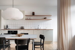 Grand Apartment | Private kitchen | Full-sized fridge, oven, stovetop, dishwasher
