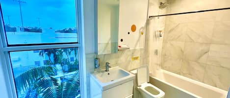 Hair dryer, towels, soap, shampoo