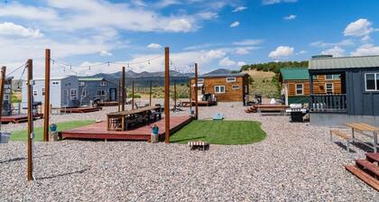 Tiny Home built by Rocky Mountain Tiny Homes in Durango, Colorado. It contains a Queen bed in a loft with stairs. Sleeps: 2 Pets: Max 2 Please note, this home does have a sleeping area in a loft. If you require an accommodation with more accessibilit