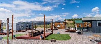 Tiny Home built by Rocky Mountain Tiny Homes in Durango, Colorado. It contains a Queen bed in a loft with stairs. Sleeps: 2 Pets: Max 2 Please note, this home does have a sleeping area in a loft. If you require an accommodation with more accessibilit