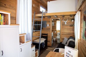 3 bedrooms - Lion Canyon was built by Mitchcraft in Fort Collins, Colorado as part of HGTV's "Tiny House Hunters". This home has two lofts, each with a Queen bed. One is accessible by stairs and one by ladder. (Meeker)