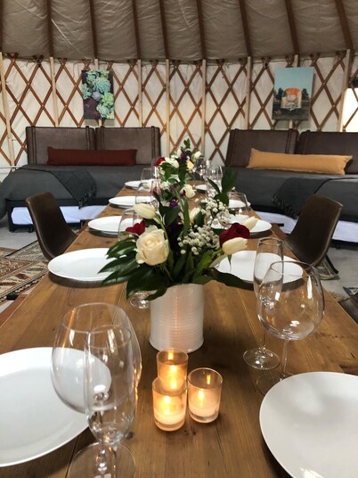 Glamp in style in our 27' yurt. Situated by our Tiny Home area.